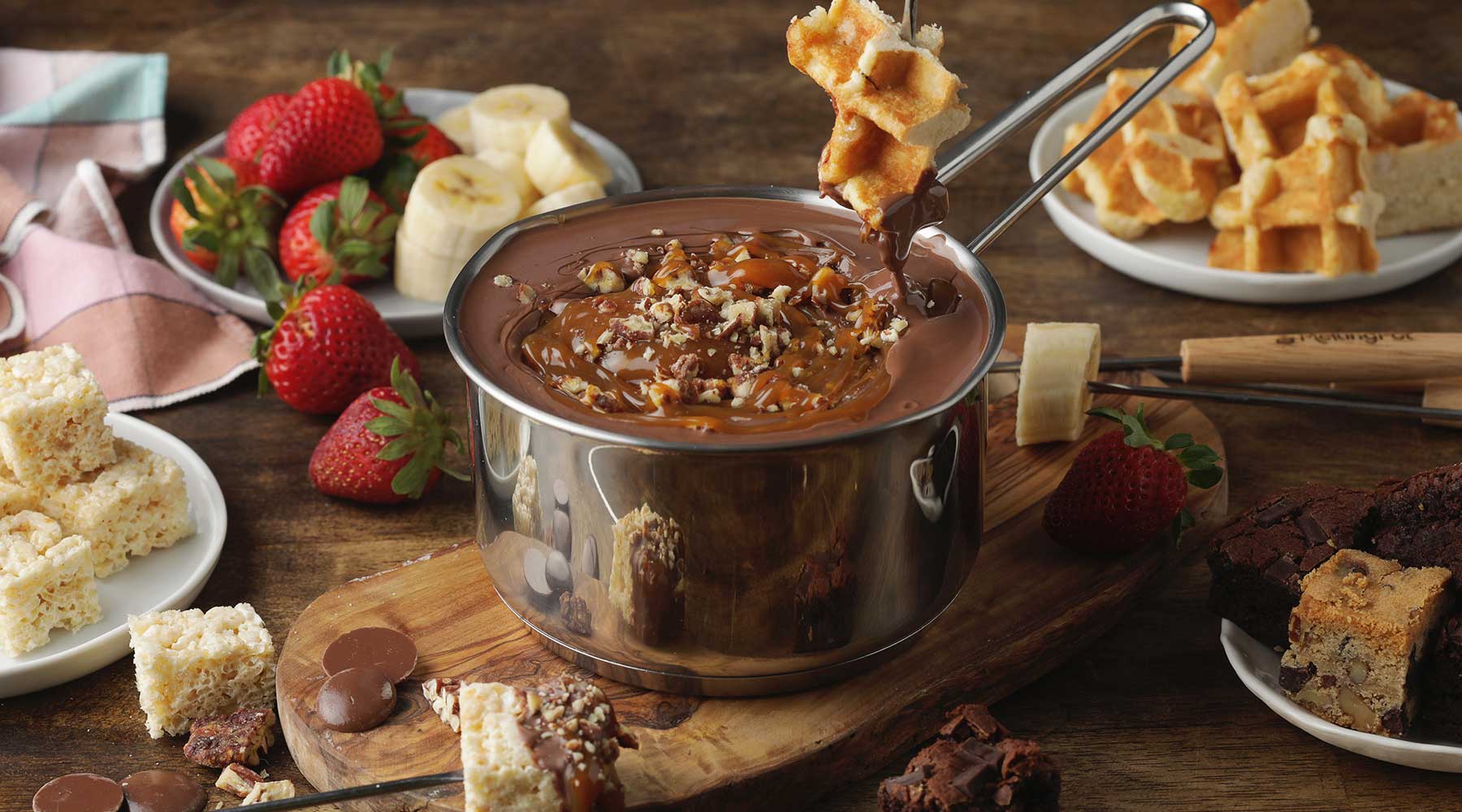 Waffle Dipped in Turtle Milk Chocolate Fondue