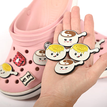 Melting Pot Shoe Charms on Shoe and in Hand